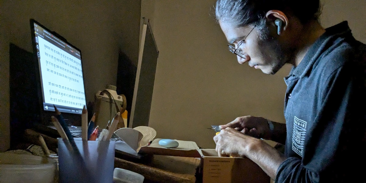 Self-employed woman working on computer at home office, representing freelancers and entrepreneurs seeking health insurance coverage