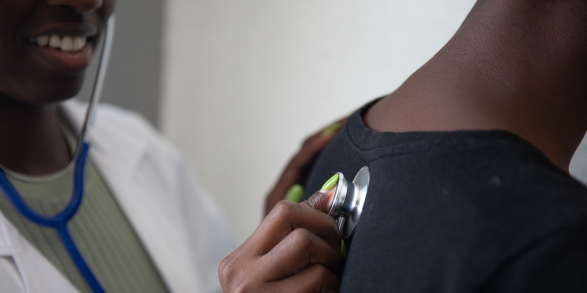 Doctor with stethoscope providing healthcare